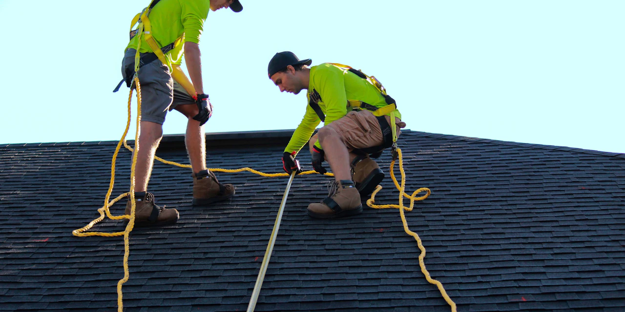 Stay Dry Roofing crew working on a roof in Orange County, CA